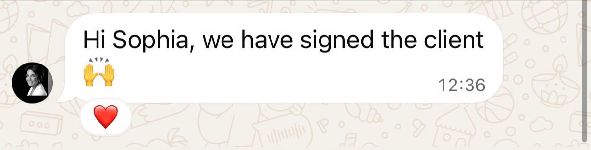 Client WhatsApp message confirming a signed client